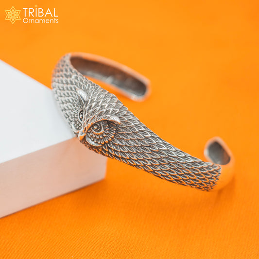 Sterling silver owl face adjustable bangle cuff bracelet by TRIBAL ORNAMENTS, featuring intricate handcrafted owl design for unisex jewelry style.