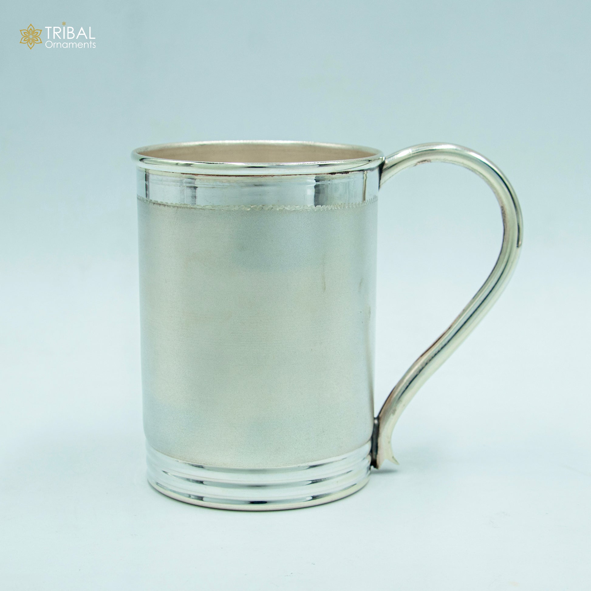 Sterling silver Tom and Jerry cartoon design coffee cup tumbler, handmade silver kids utensils and baby food flask by Tribal Ornaments.