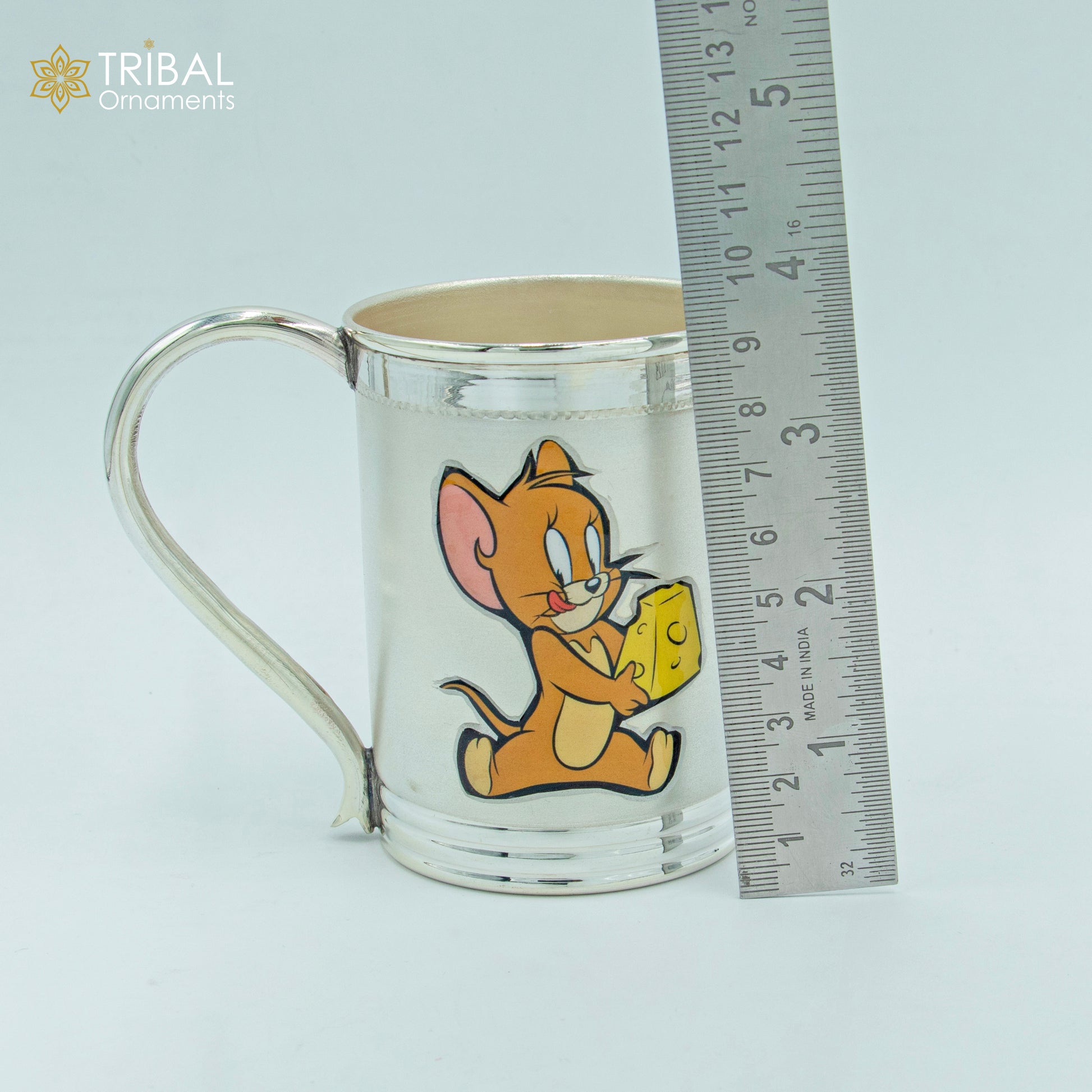 Sterling silver Tom and Jerry cartoon design coffee tumbler, baby food flask, and kids utensils by TRIBAL ORNAMENTS.