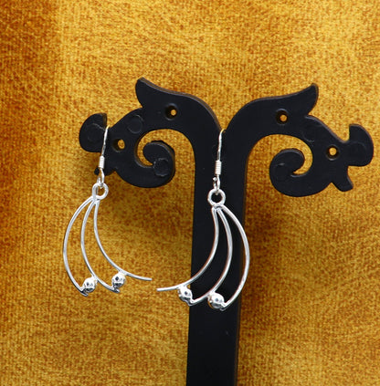 Sterling silver handmade geometric hoop earring with elegant drop dangle design from Tribal Ornaments, perfect for stylish gifts.