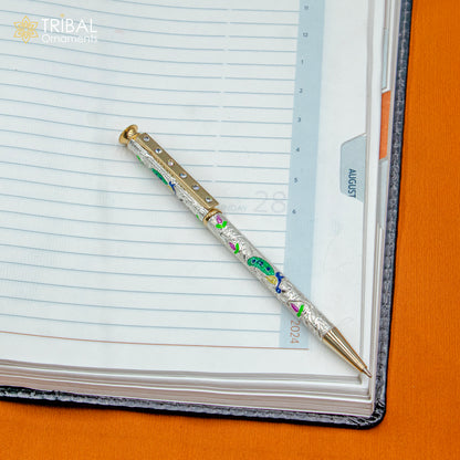 925 Sterling silver handmade peacock design writing ball pen by TRIBAL ORNAMENTS, featuring intricate silver craftsmanship from India.