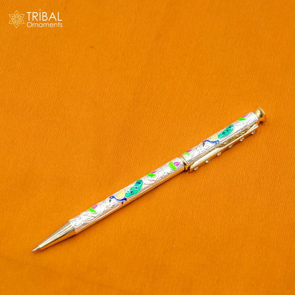 925 Sterling silver handmade peacock design writing ball pen by TRIBAL ORNAMENTS, showcasing detailed silver craftsmanship.