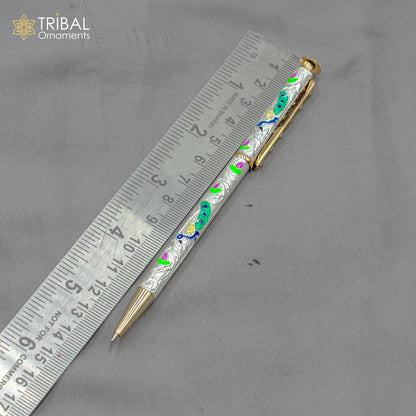 925 Sterling silver handmade peacock design writing ball pen by TRIBAL ORNAMENTS, showcasing intricate silver craftsmanship.