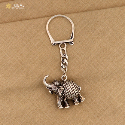 Sterling silver vintage elephant design key chain by TRIBAL ORNAMENTS featuring intricate handmade tribal ornament details.