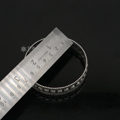 Vintage design 925 sterling silver tribal bangle bracelet featuring intricate ethnic pattern and handmade craftsmanship.
