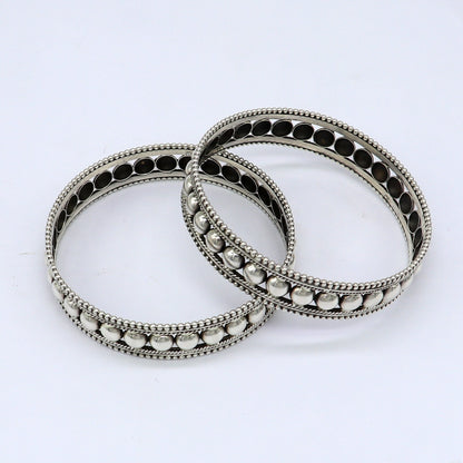 Vintage 925 sterling silver bangle bracelet with tribal ethnic design by TRIBAL ORNAMENTS, showcasing handmade craftsmanship and intricate patterns.