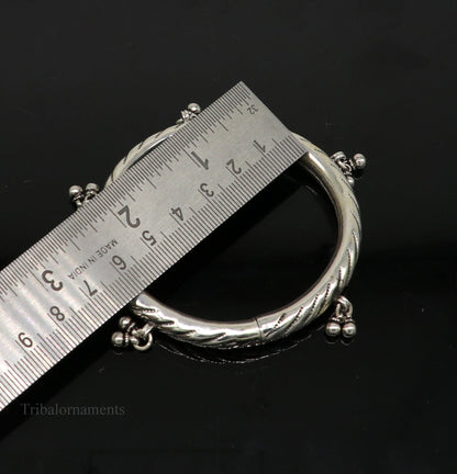 Sterling silver vintage tribal charm bangle bracelet with hanging drops, handcrafted tribal jewelry by TRIBAL ORNAMENTS.