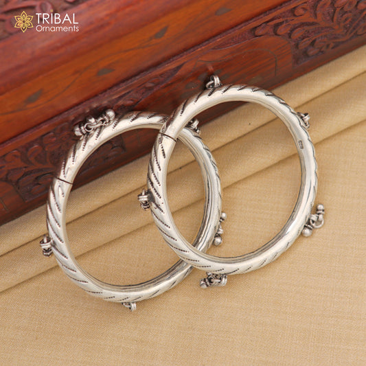 Sterling silver vintage tribal charm bangle bracelet with hanging drops, handcrafted tribal jewelry by TRIBAL ORNAMENTS.
