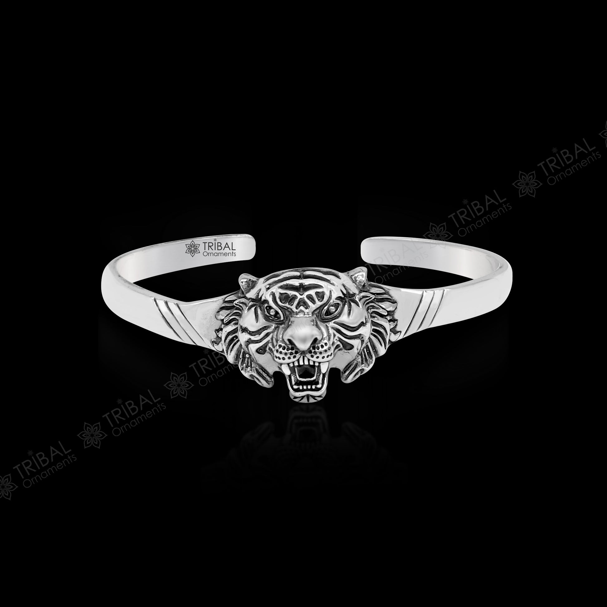 Sterling silver handmade vintage lion design bangle cuff bracelet by TRIBAL ORNAMENTS, adjustable tribal style jewelry for daily wear.