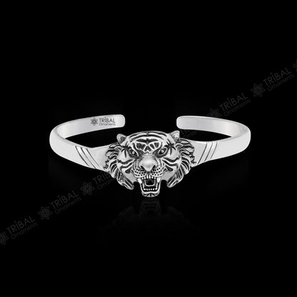 Sterling silver handmade vintage lion design bangle cuff bracelet by TRIBAL ORNAMENTS, adjustable tribal style jewelry for daily wear.