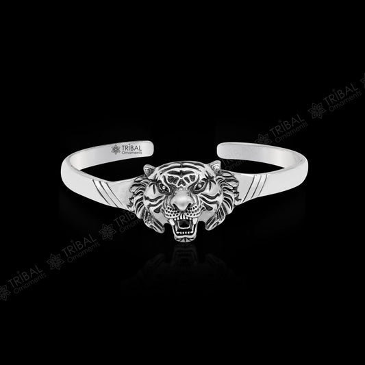 Sterling silver handmade vintage lion design bangle cuff bracelet by TRIBAL ORNAMENTS, adjustable tribal style jewelry for daily wear.