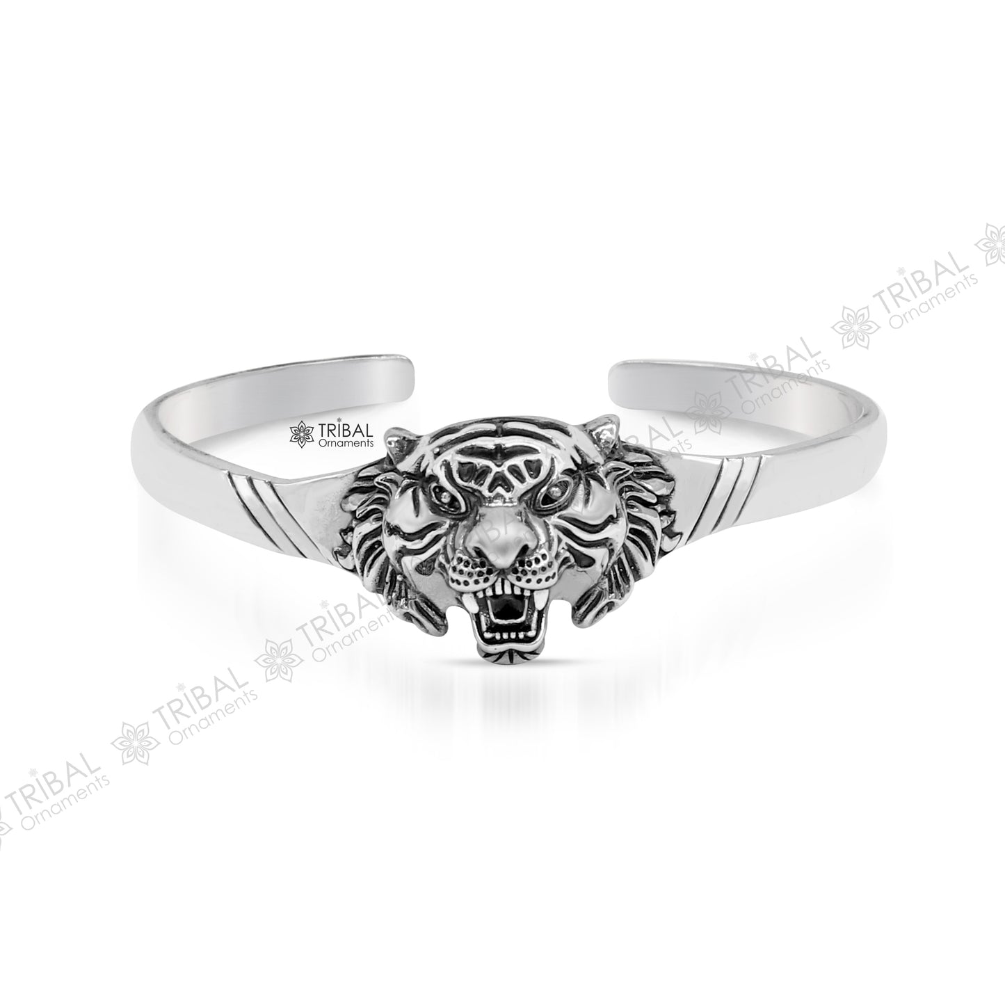 Sterling silver handmade vintage lion design bangle cuff bracelet by Tribal Ornaments, adjustable tribal-style jewelry for daily wear.