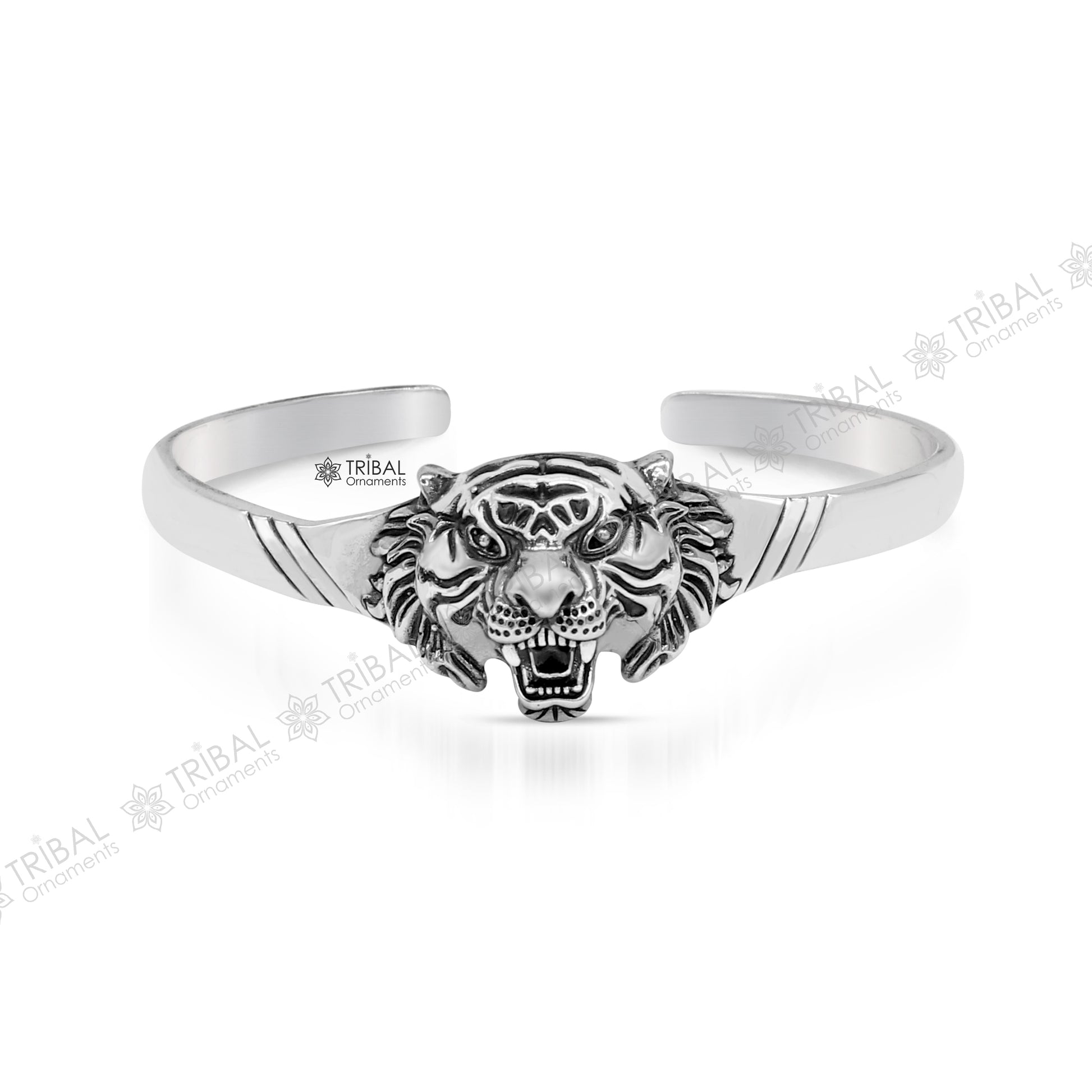 Sterling silver handmade vintage lion design bangle cuff bracelet by Tribal Ornaments, adjustable tribal-style jewelry for daily wear.