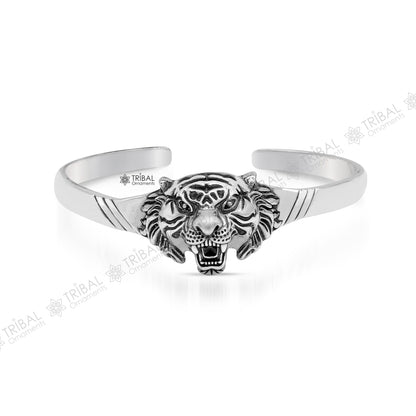 Sterling silver handmade vintage lion design bangle cuff bracelet by Tribal Ornaments, adjustable tribal-style jewelry for daily wear.