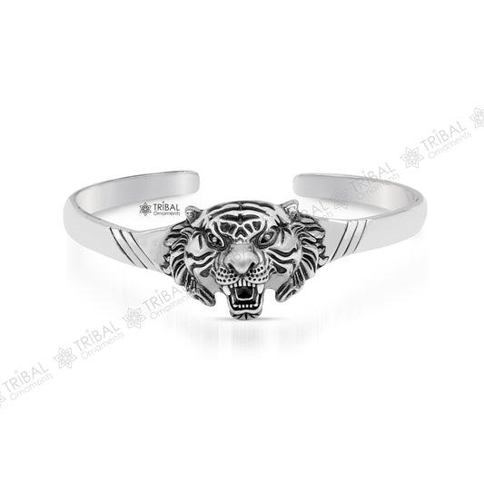 Sterling silver handmade vintage lion design bangle cuff bracelet by Tribal Ornaments, adjustable tribal-style jewelry for daily wear.