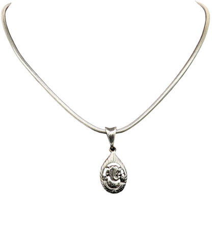 Sterling silver Ganesha pendant by Tribal Ornaments, unisex jewelry featuring a handcrafted vintage-style Hindu idol design.