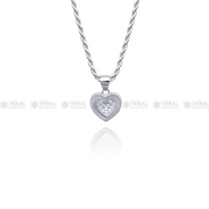 Sterling silver heart-shaped pendant set with diamond cubic zirconia stones, crafted by Tribal Ornaments.