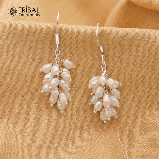 Sterling silver hoops earring with a beautiful pearl from Tribal Ornaments, showcasing elegant jewelry design.