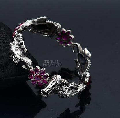 925 sterling silver Ganesha bangle bracelet with floral design and red stone accents, tribal ethnic jewelry by TRIBAL ORNAMENTS
