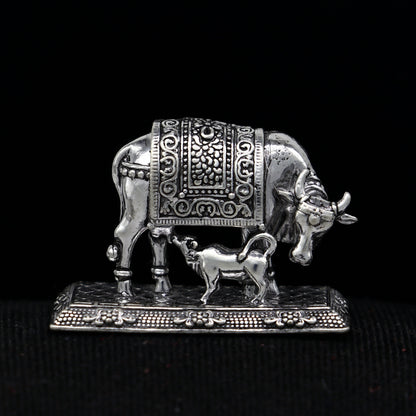 925 sterling silver Kamdhenu cow figurine representing prosperity and wealth, a decorative deity sculpture for worship.