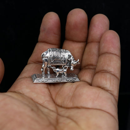 925 sterling silver Kamdhenu cow figurine by Tribal Ornaments, deity's wishing cow symbolizing wealth and prosperity.