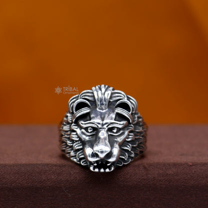 925 sterling silver lion face ring by TRIBAL ORNAMENTS, adjustable men's ring with detailed lion design on the face.