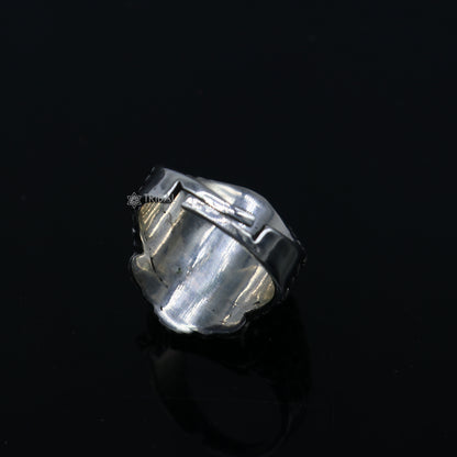 Sterling silver lion face ring by Tribal Ornaments, adjustable men's ring with detailed lion head design.