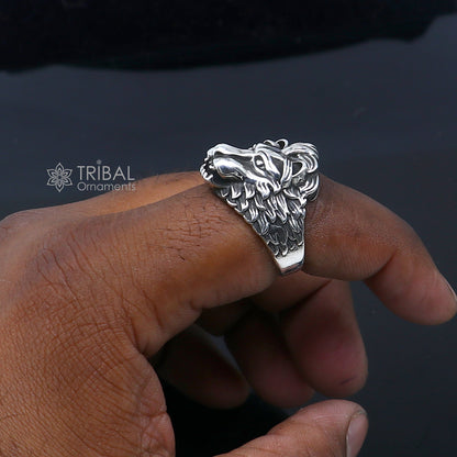 Sterling silver lion face ring by TRIBAL ORNAMENTS, adjustable best man's ring with detailed lion design and smooth band.