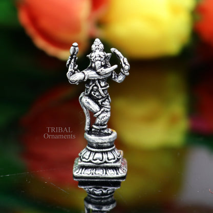 Small handcrafted 925 sterling silver Lord Ganesh idol statue in dancing style, ideal for Diwali puja and spiritual gift.
