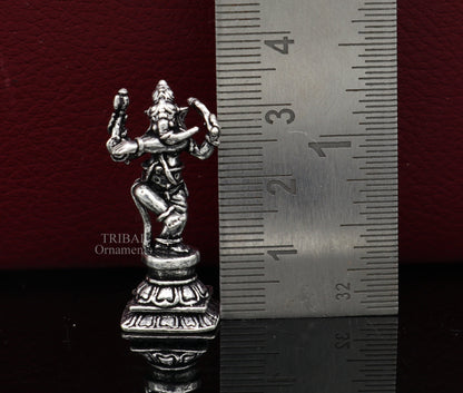 Small handcrafted 925 Sterling silver Lord Ganesh idol statue, dancing style figurine for Diwali puja and spiritual decor.
