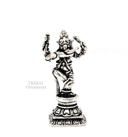 Small handcrafted 925 sterling silver Lord Ganesh idol statue in dancing style, ideal for Diwali puja or gift.