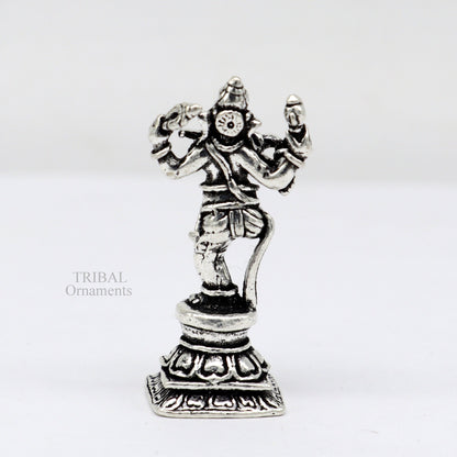 Small handcrafted 925 sterling silver Lord Ganesh idol in dancing pose, ideal for Diwali puja or as a decorative figurine.