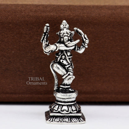 Small handcrafted 925 sterling silver Lord Ganesh idol in dancing pose, ideal for Diwali puja and spiritual decor.