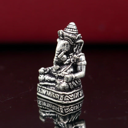 Small 925 sterling silver Lord Ganesh idol figurine, handcrafted sculpture for Diwali puja and spiritual decoration.