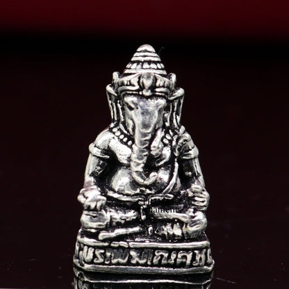 Handcrafted 925 Sterling silver Lord Ganesh idol small statue, detailed sculpture for Diwali puja and spiritual decoration.