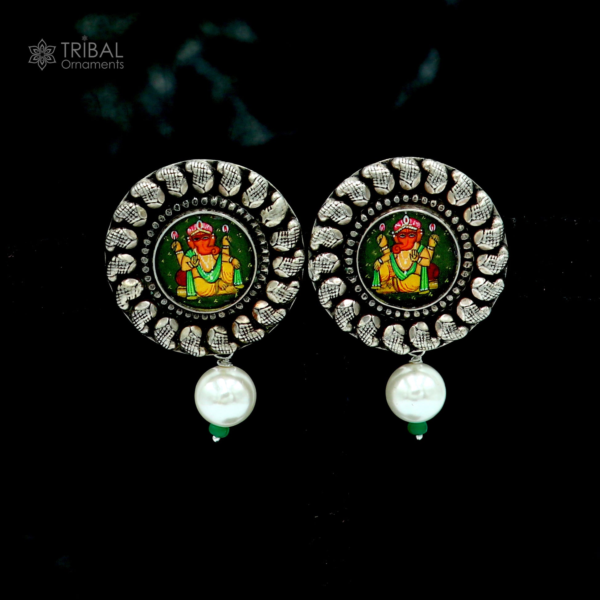 Sterling silver Lord Ganesha miniature art painting hoops earrings by TRIBAL ORNAMENTS showing intricate Ganesha design