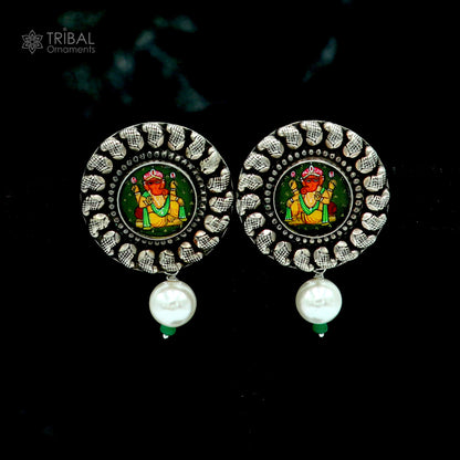 Sterling silver Lord Ganesha miniature art painting hoops earrings by TRIBAL ORNAMENTS showing intricate Ganesha design