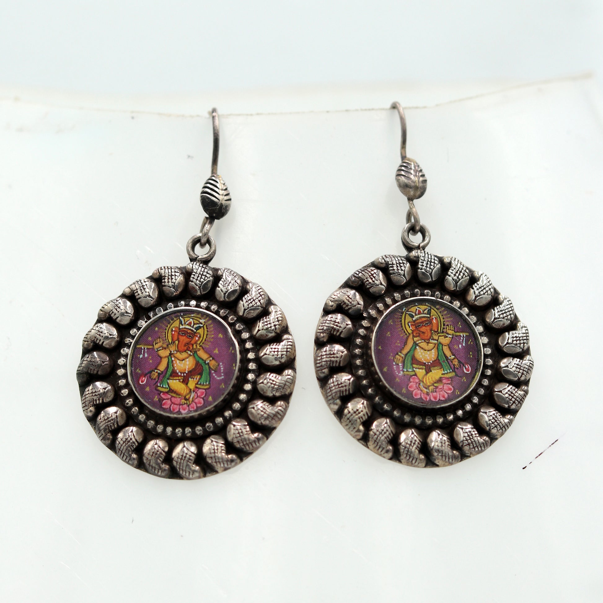 925 silver Lord Ganesha miniature painting dangle earrings by TRIBAL ORNAMENTS with traditional artistic design