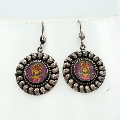 925 silver Lord Ganesha miniature painting dangle earrings by TRIBAL ORNAMENTS with traditional artistic design