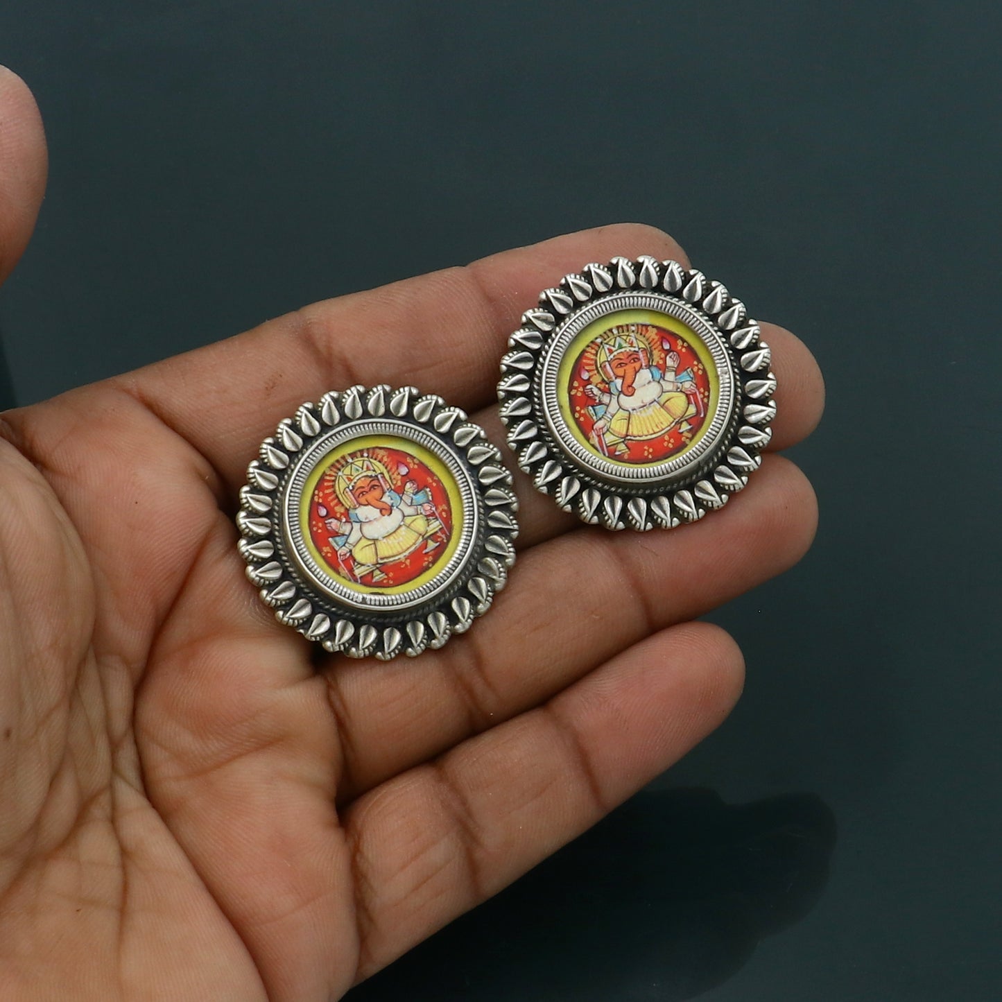 Sterling silver Lord Ganesha miniature painting earrings by Tribal Ornaments featuring detailed Ganesha artwork on hoops.