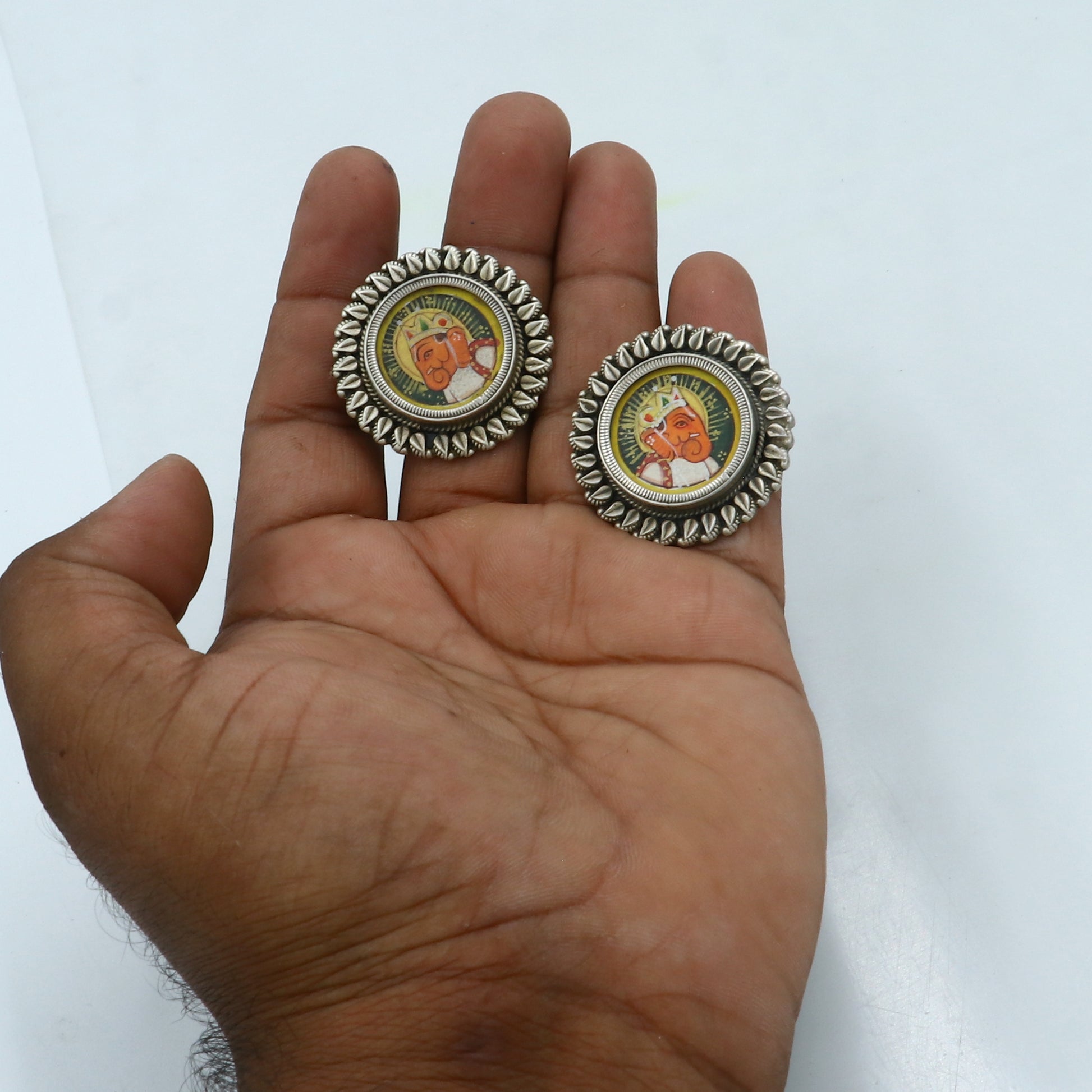 925 sterling silver Lord Ganesha miniature painting hoop earrings by TRIBAL ORNAMENTS, featuring detailed Ganesha artwork on silver hoops.