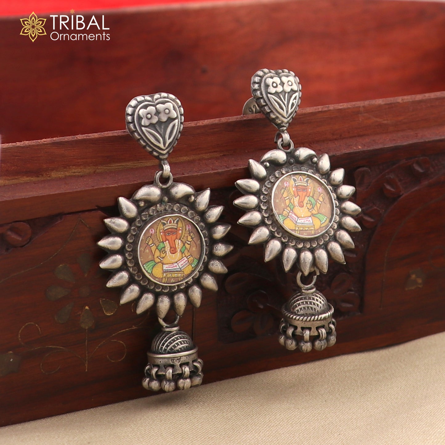 Sterling silver Lord Ganesha miniature art earrings featuring detailed Ganesha painting in hoop style by TRIBAL ORNAMENTS.