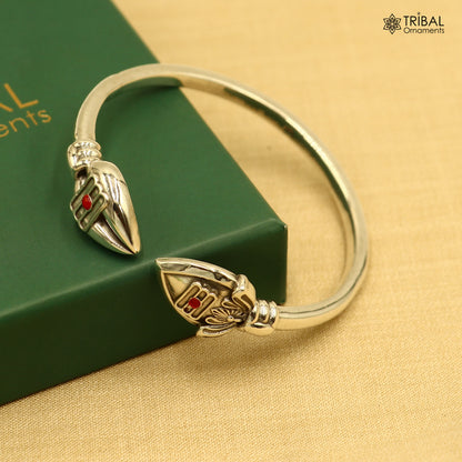 Unisex 925 sterling silver Lord Kartikeya adjustable bangle cuff bracelet with intricate tribal design.