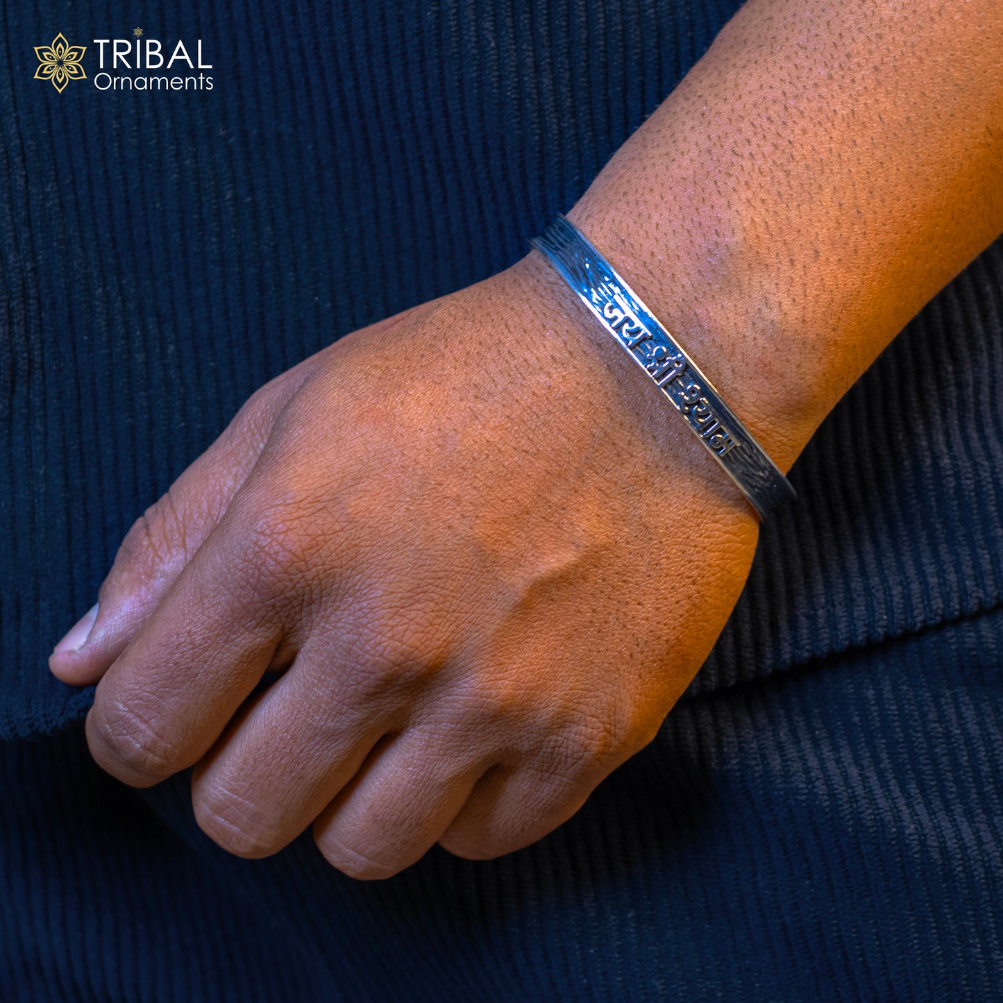 Sterling silver Lord Krishna mantra "JAI SHRI SHYAM" adjustable cuff bracelet for men and women with intricate tribal design.
