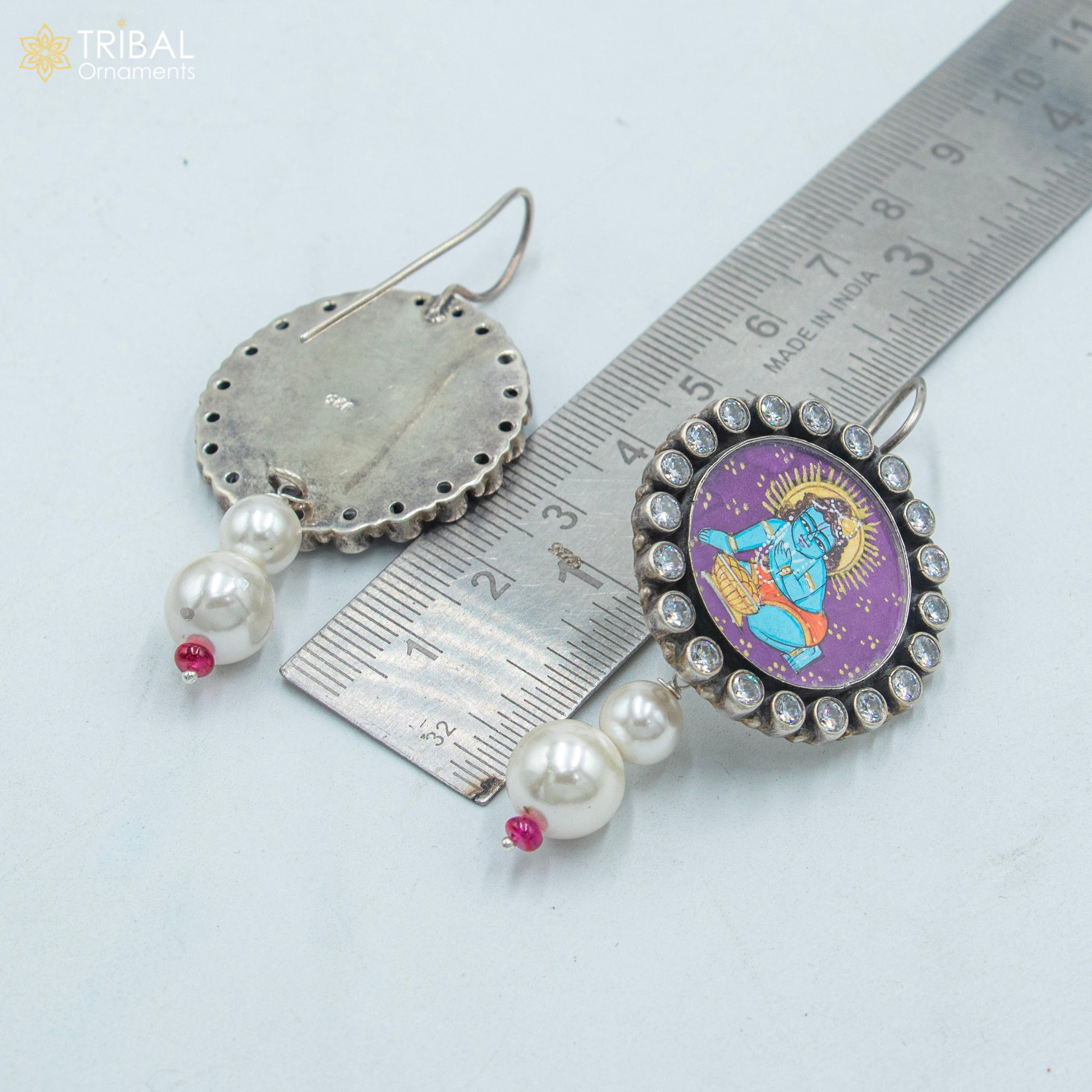 Sterling silver Lord Krishna miniature art painting hoops earrings by TRIBAL ORNAMENTS, featuring detailed Krishna design.