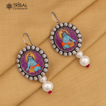 925 sterling silver Lord Krishna miniature art painting hoops earrings by Tribal Ornaments featuring detailed Krishna design.
