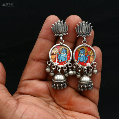Sterling silver Lord Krishna miniature painting hoops earrings by TRIBAL ORNAMENTS with intricate artwork and traditional design.