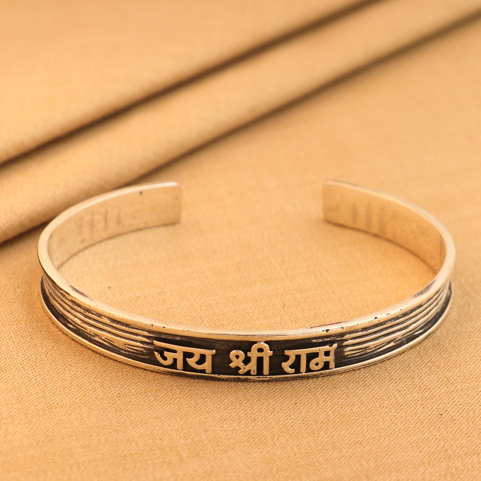 Sterling silver Lord Rama mantra "JAI SHRI RAM" adjustable unisex bangle cuff bracelet by Tribal Ornaments with engraved design.