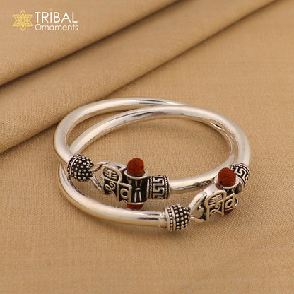 925 Sterling silver Lord Shiva trident bangle for kids with intricate tribal design, featuring Shiva motif on a traditional kada style bracelet.