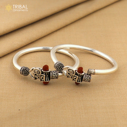Sterling silver Lord Shiva trident bangle for kids, featuring intricate tribal design on a traditional Shiva-themed jewelry piece.